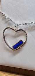 Lightning Ridge 0.75 ct doublet pendant.