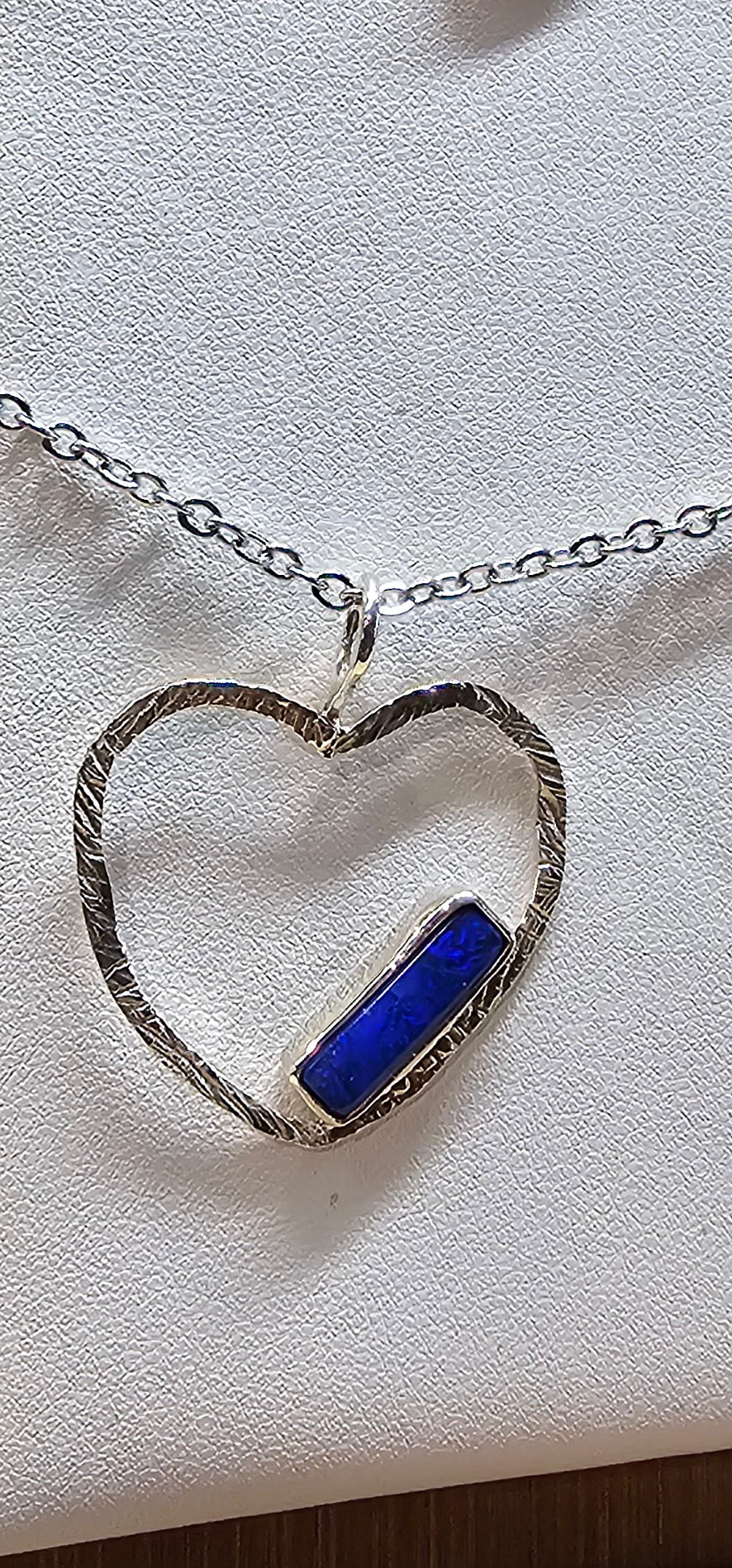 Lightning Ridge 0.75 ct doublet pendant.