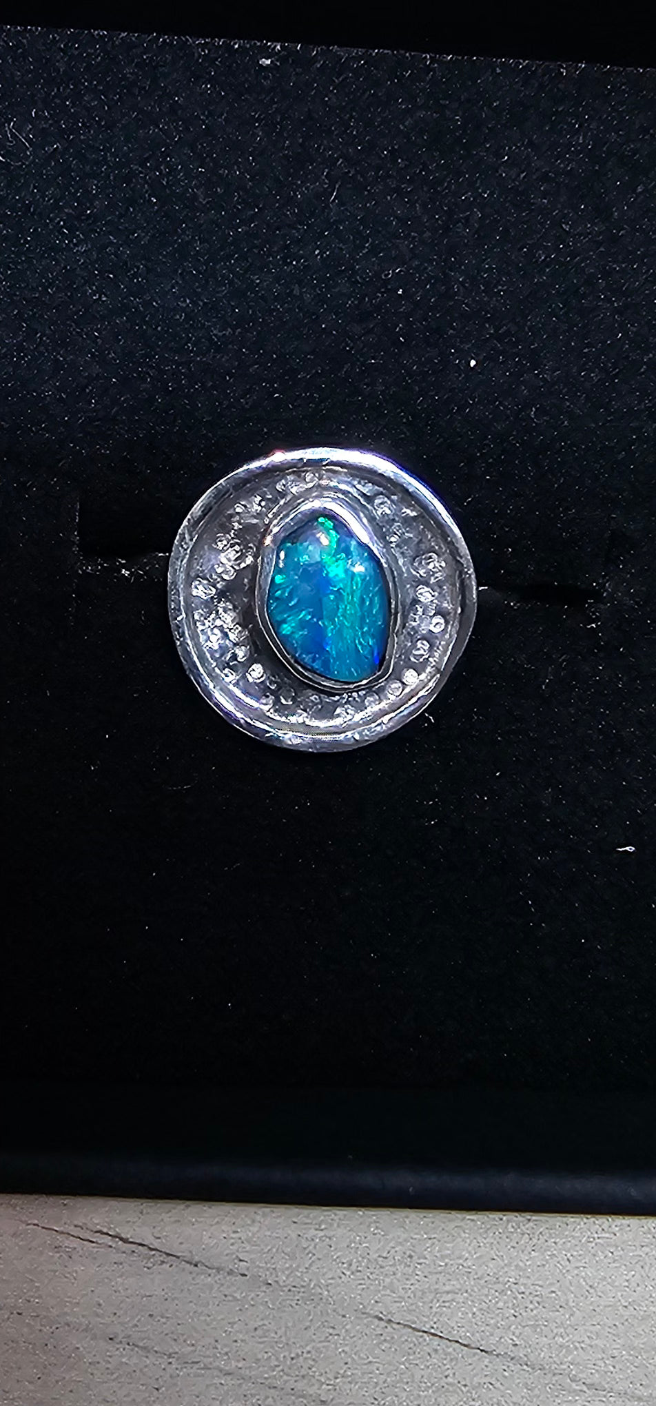 Lightning Ridge 0.40ct solid black opal ring.