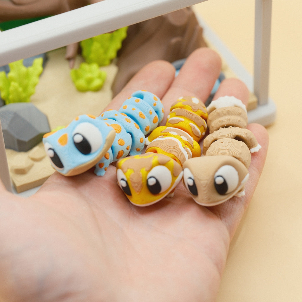 69128a9eaba6d113bfcf572d_gecko-toy-set-3_1764335804071.jpg