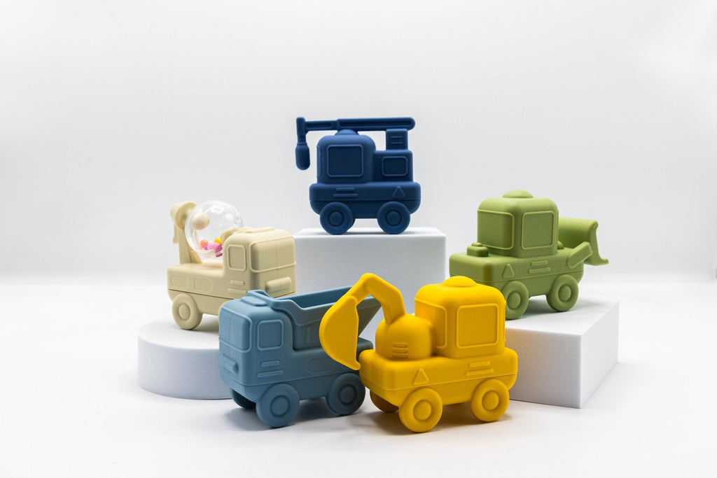 69128a9eaba6d113bfcf572d_silicone-bath-toys-contruction-trucks_1764115953998.jpg