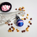 69a53347e6f476195c1e68ac_blue-bottle-stopper_1787046983528.png