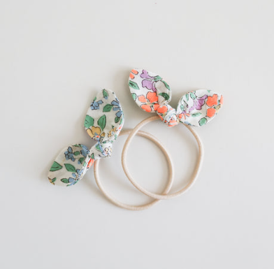 69a53347e6f476195c1e68ac_bunny-ties_1790229640029.png