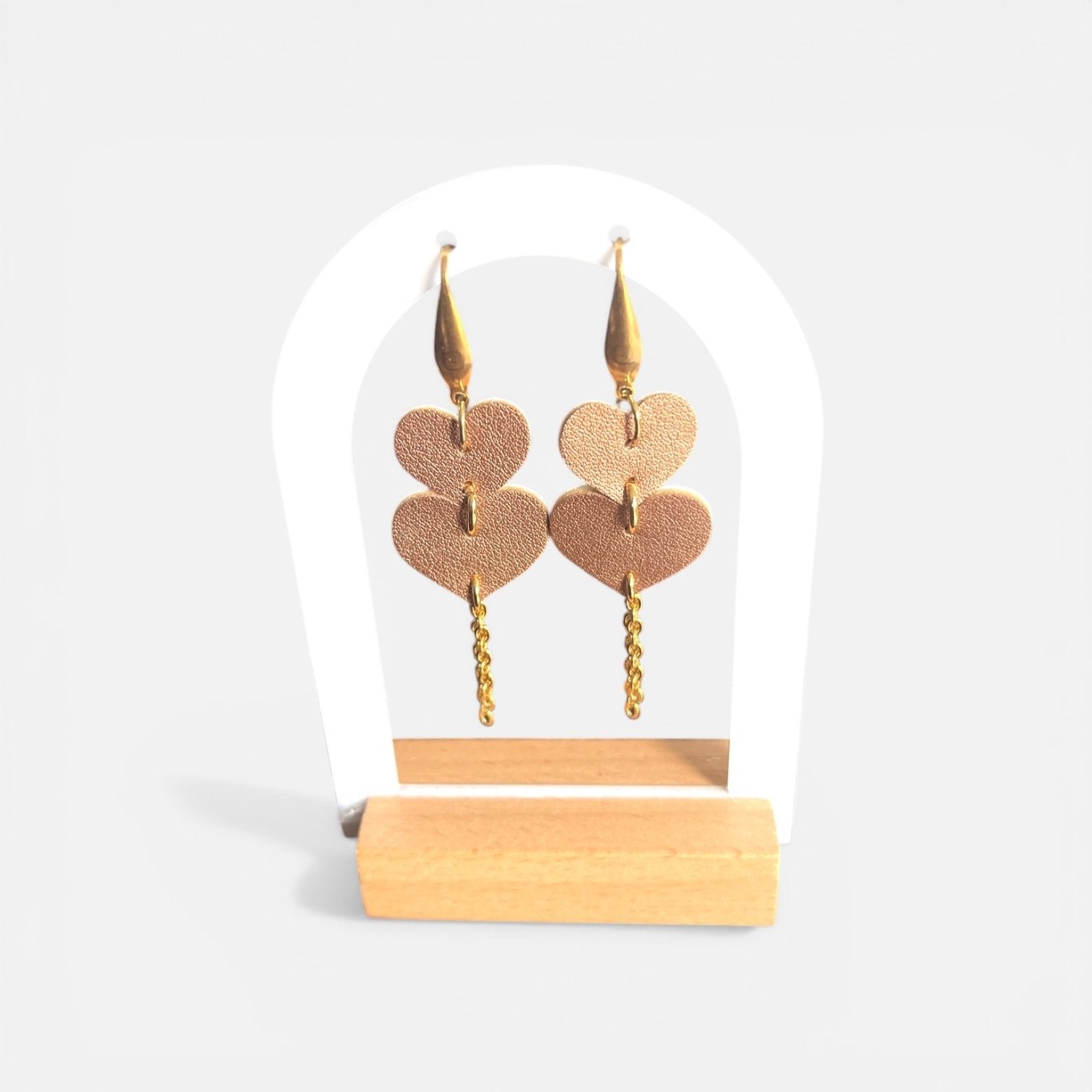 69a53347e6f476195c1e68ac_heart-dangle-earrings_1781165485924.jpg