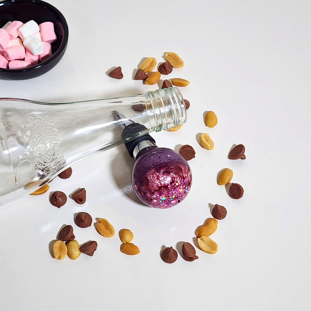 69a53347e6f476195c1e68ac_pink-bottle-stopper_1787047224139.png