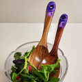 69a53347e6f476195c1e68ac_purple-salad-servers_1787045457613.png