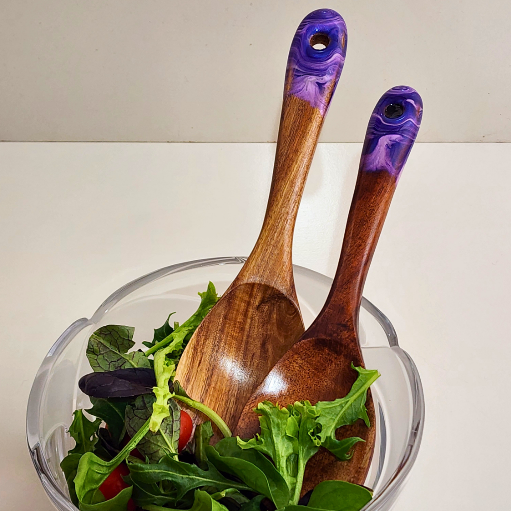 69a53347e6f476195c1e68ac_purple-salad-servers_1787045457613.png