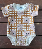 69a53347e6f476195c1e68ac_teddy-bear-mustard_1781934614432.png