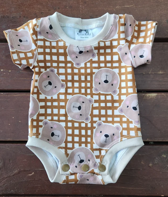69a53347e6f476195c1e68ac_teddy-bear-mustard_1781934614432.png