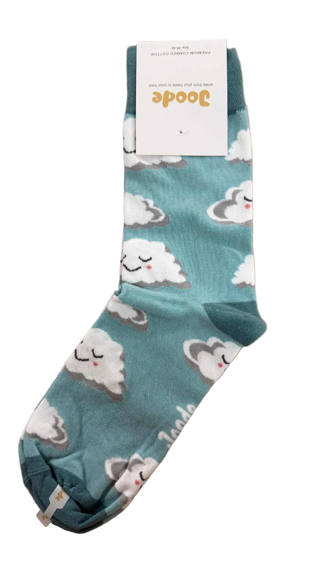 A single teal blue sock with a white and gray cloud pattern, featuring a white paper tag with the brand name 'Goode' attached, placed on a wooden surface.