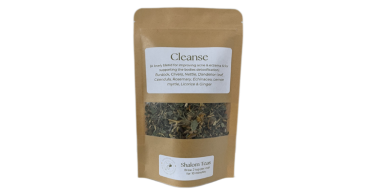 Tea package labeled 'Cleanse' by Shalom Tea on a white background